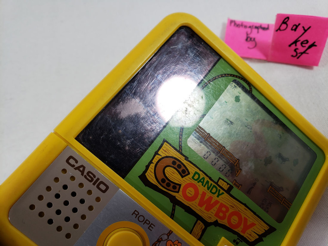 SEE VIDEO Dandy Cowboy LCD Game Solar Power powered CASIO 1983 CG