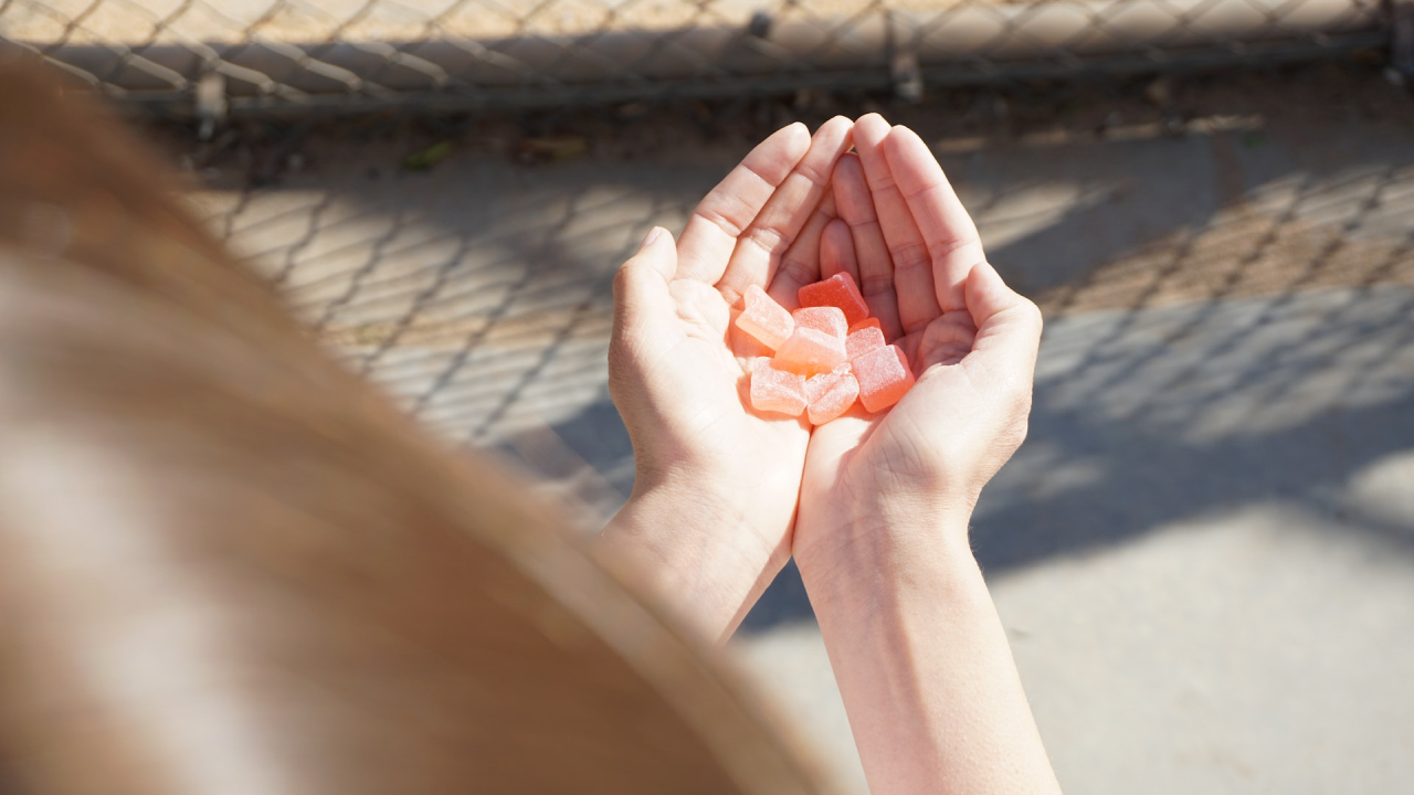 CBD gummies in hand