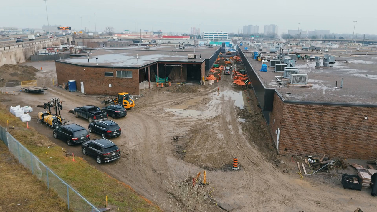 Aerial view of the TWI Foods expansion site in Etobicoke with the corridor between the two operating buildings excavated