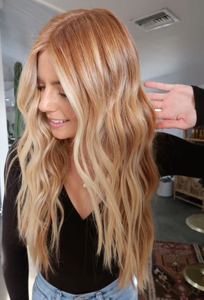 Long wavy hair in golden melon color