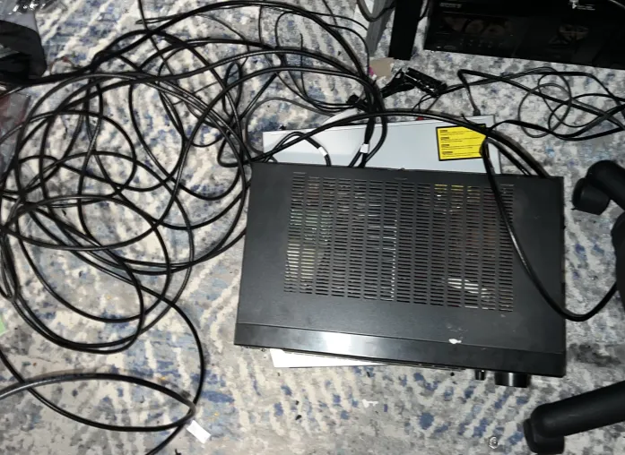 top view of a reciever with many cables coming off of it