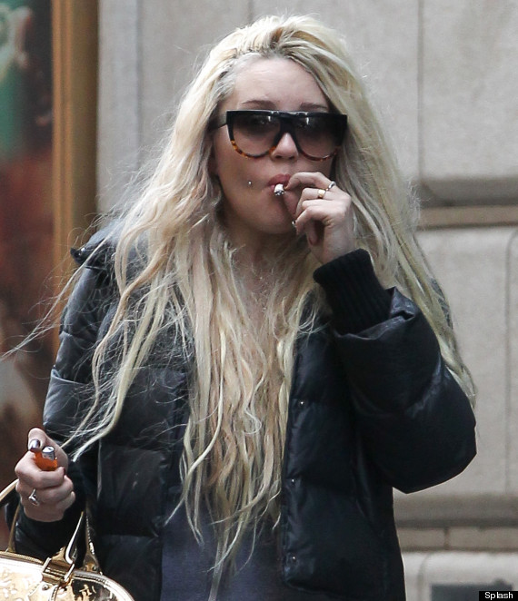 Amanda Bynes smoking a cigarette (or weed)
