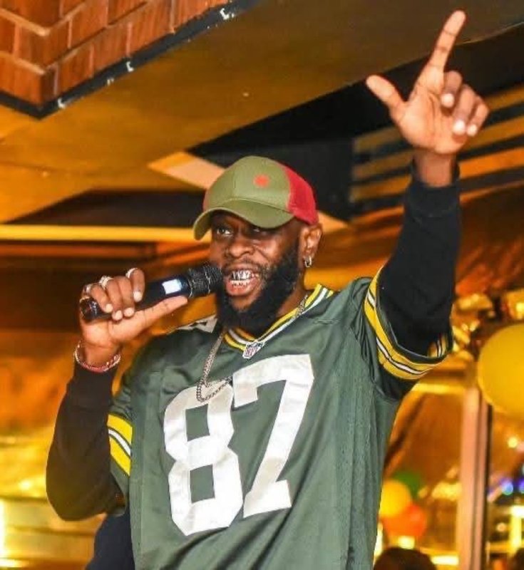 MC Fullstop on stage performing for fans