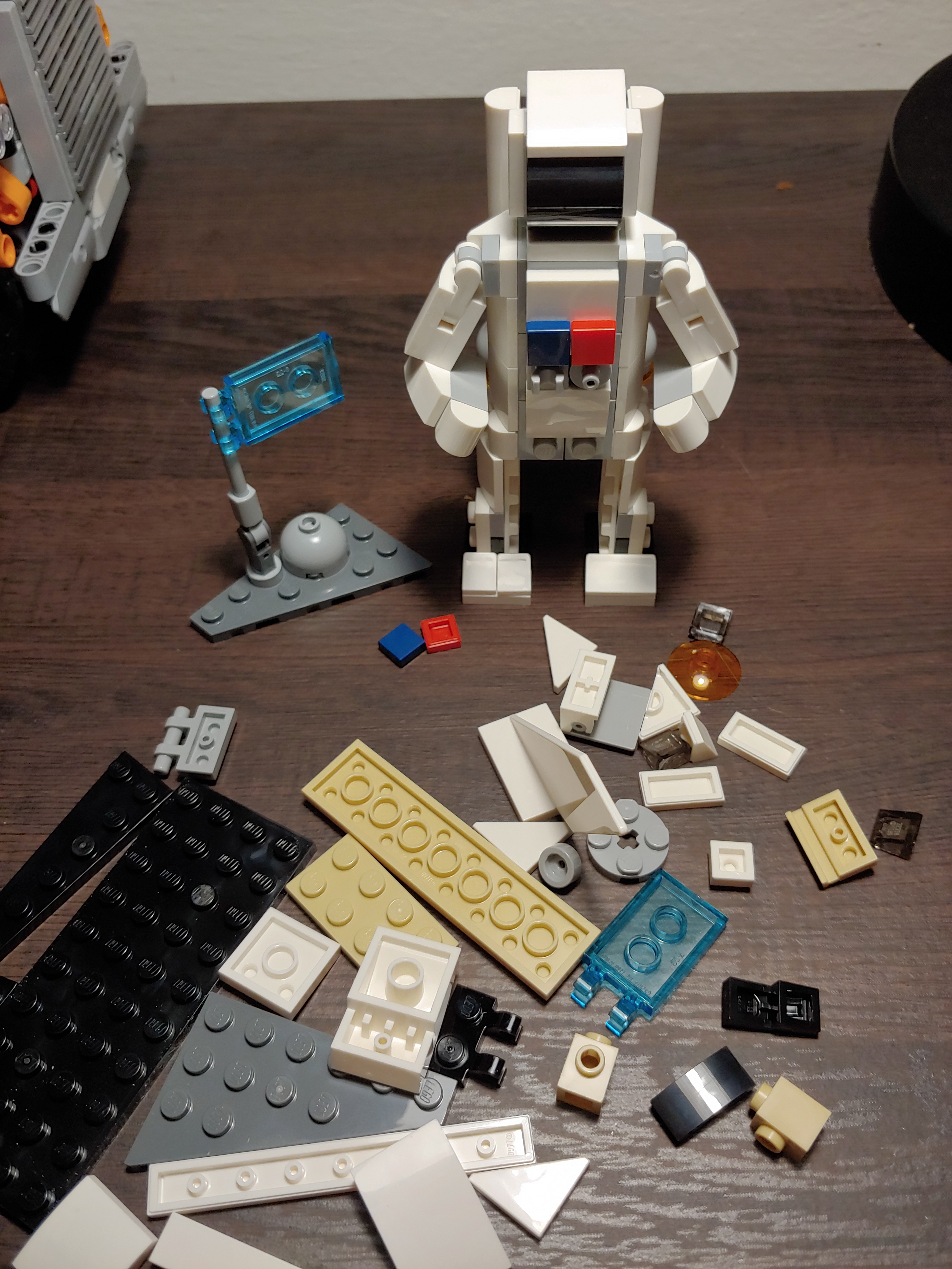The astronaut, surrounded by unused parts.