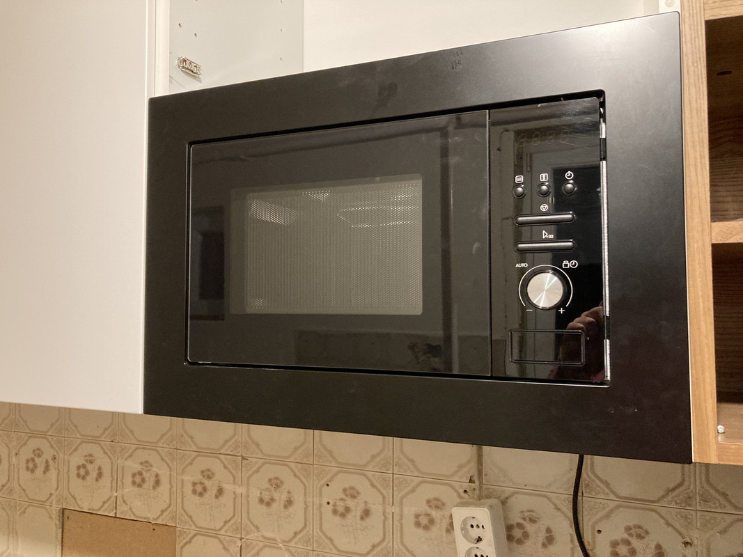 How to install the VÄRMD microwave, so the bottom is level with the door  next to it? : r/IKEA