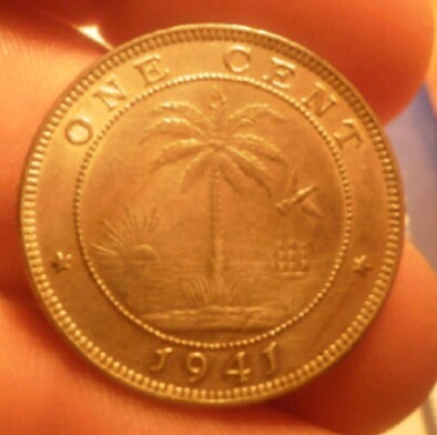 Una moneda de aquella caja de metal de los años 20 20190106-171142