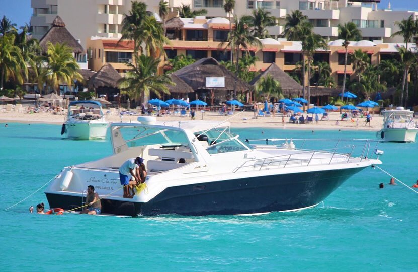 Shana 46 ft yacht charter Cancun - Interior view showing luxury amenities and comfortable seating for 15 guests