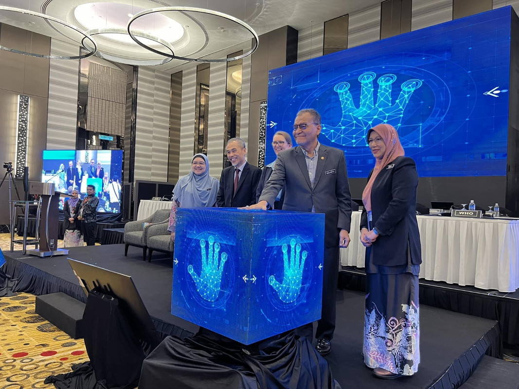 “Malaysia’s Minister for Health, Datuk Seri Dr Dzulkefly bin Ahmad, initiates playout of a CCFO 60th anniversary video with the touch of his hand”